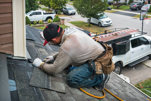 Professional Roof Replacement technician working in East Otis, MA